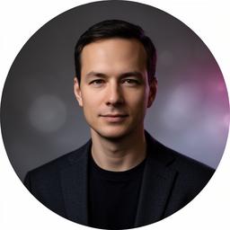A cryptographer portrait in a softly lit studio wearing a dark blazer