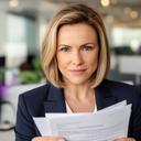 General counsel reviewing contracts in a modern office setting
